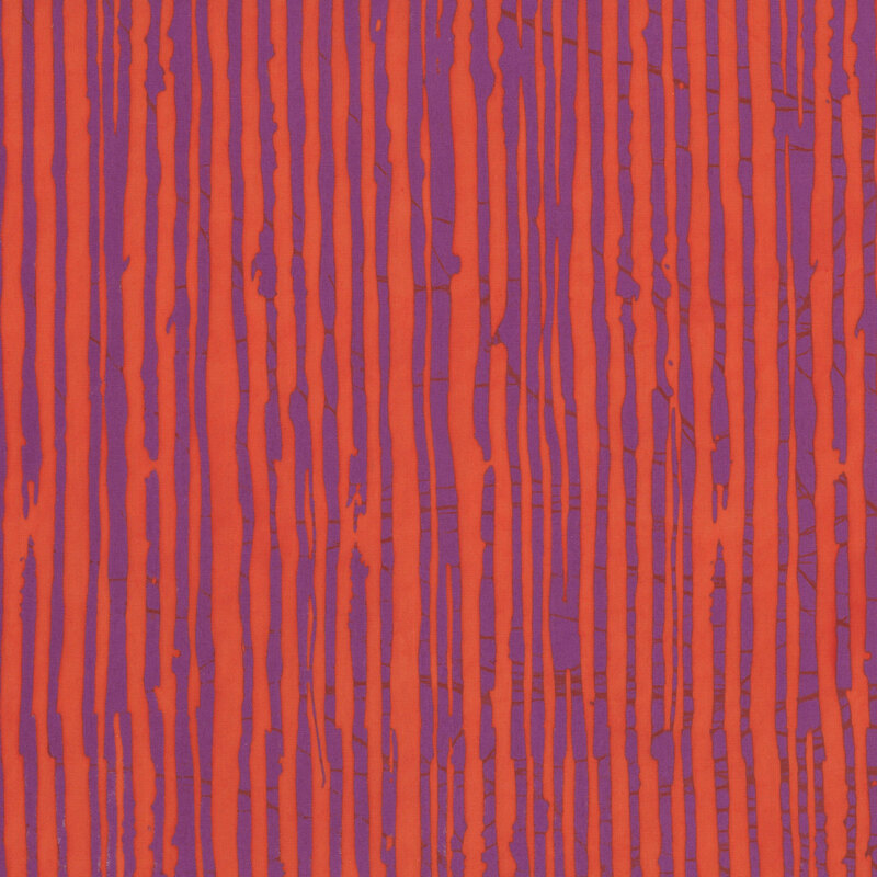A coral orange batik fabric featuring irregular dark magenta vertical stripes.