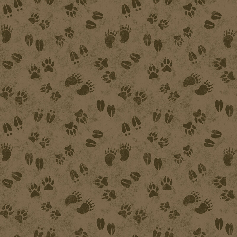 Brown fabric with a playful tossed pattern of assorted animal tracks.