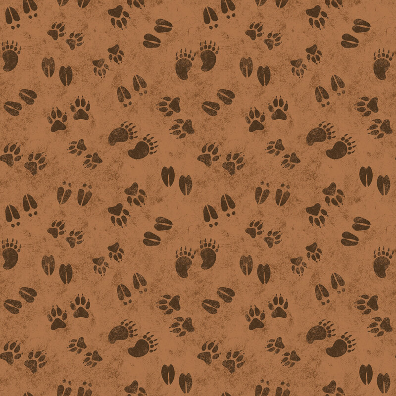 Brown fabric with a playful tossed pattern of assorted animal tracks.