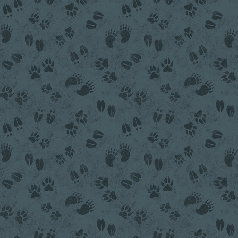 Mottled blue fabric with a playful tossed pattern of assorted animal tracks.