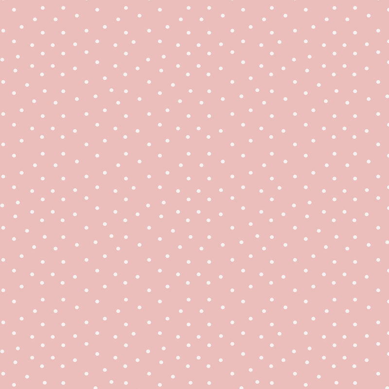 A pastel pink fabric with white polka dots. 