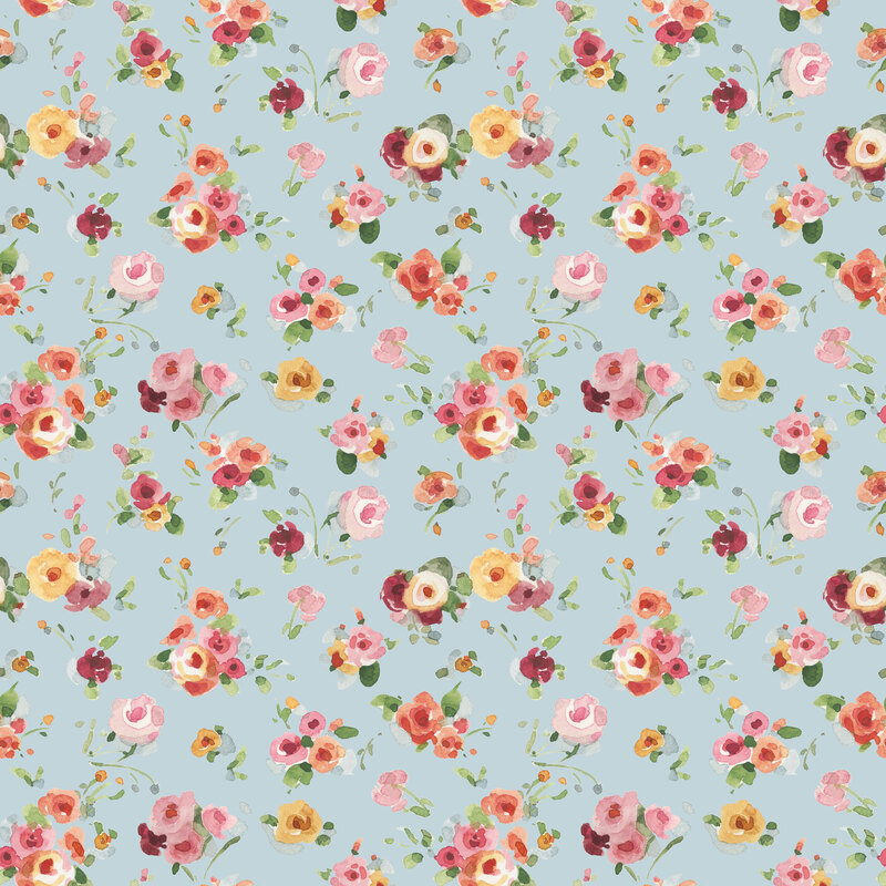A light blue fabric featuring scattered watercolor florals.