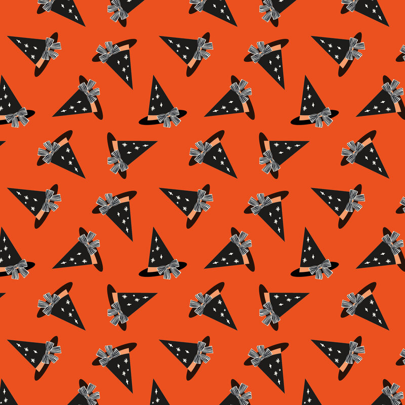 A bright orange fabric with scattered witches hats. 