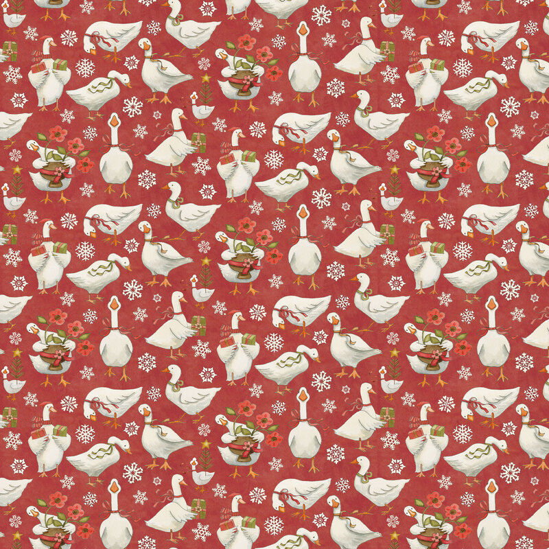 Red mottled fabric with white geese in different poses and scenarios surrounded by a medley of white snowflakes.