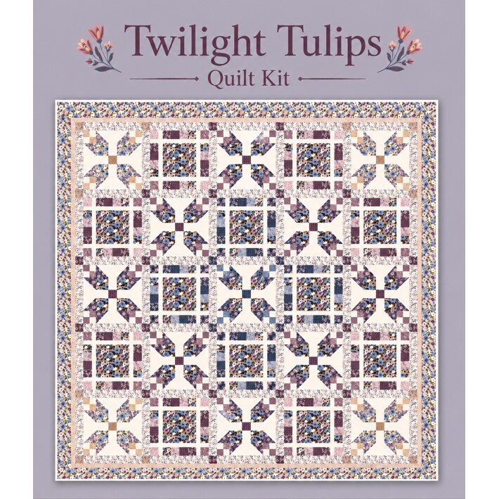 Mockup of the completed Twilight Tulips quilt, a patchwork project in cream, dusky purple, blue, and pink on a purple background