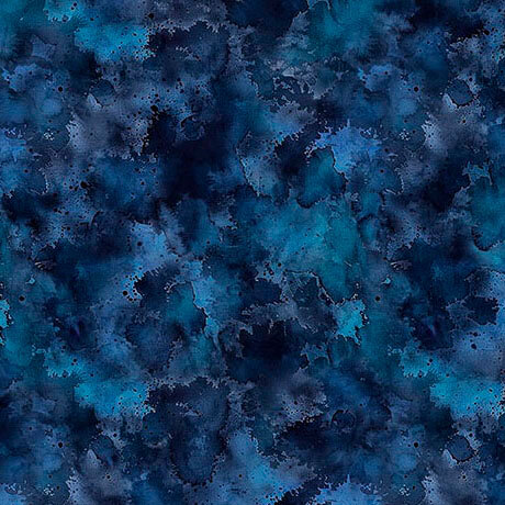 An indigo blue fabric with watercolor texture and scattered speckles.