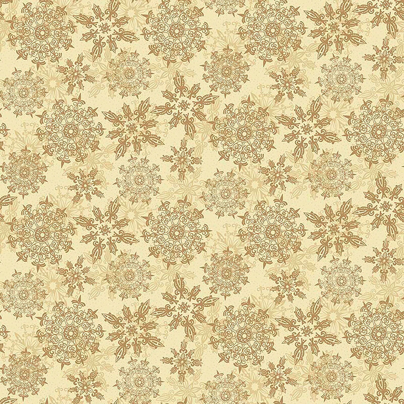 Mottled cream fabric with a layered and tossed design of tan, stylized snowflakes.