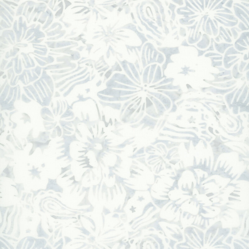 Light smoke gray batik with a white floral design stamped on top.