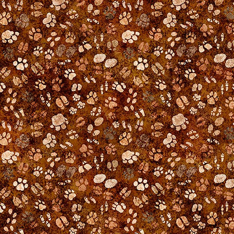 Mottled, deep sienna orange fabric with a tossed pattern of safari animal paw prints from tan to dark brown.