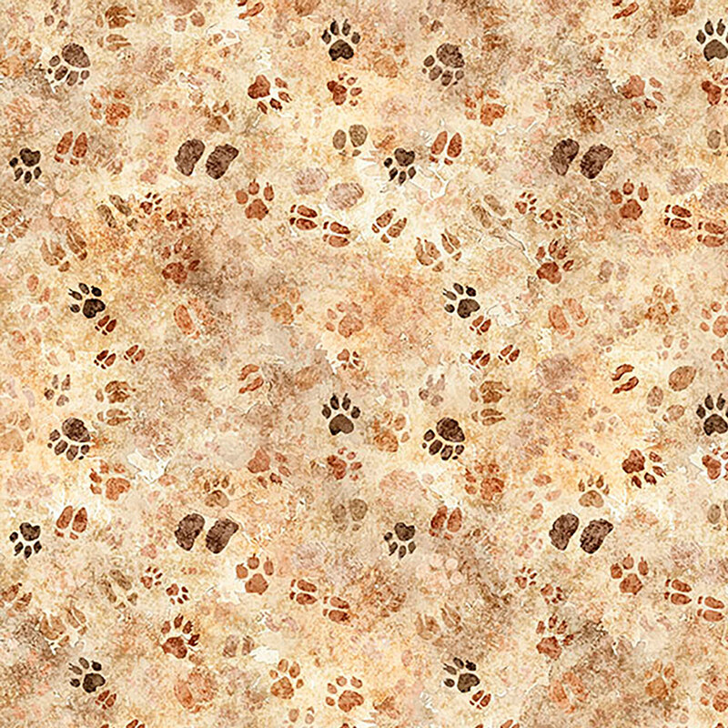Mottled, tan fabric with a tossed pattern of safari animal paw prints from tan to dark brown.