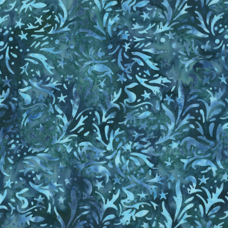 This dark teal blue batik fabric features teal swirls, stars, and leaves. 