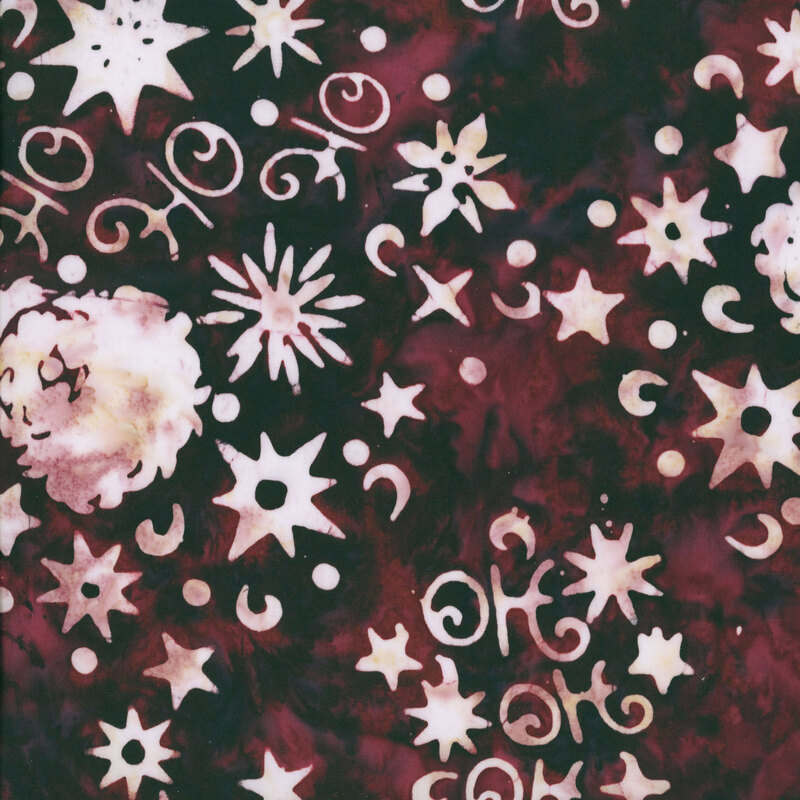 This black cherry and coal batik fabric features cream Santa Claus figures and stars. 