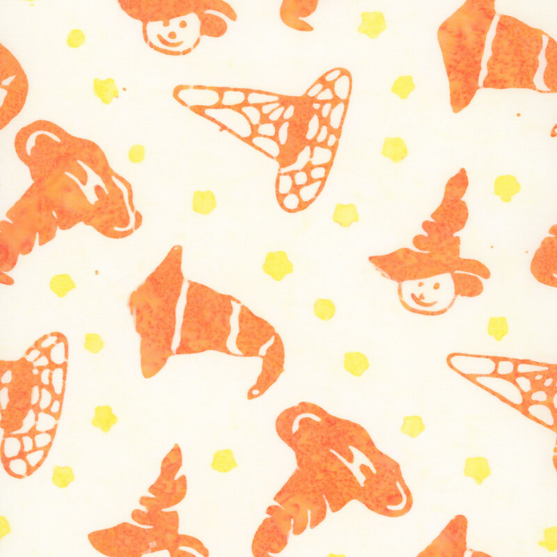 Cream batik with a tossed design of yellow spots and a medley of stylized orange witch hats.