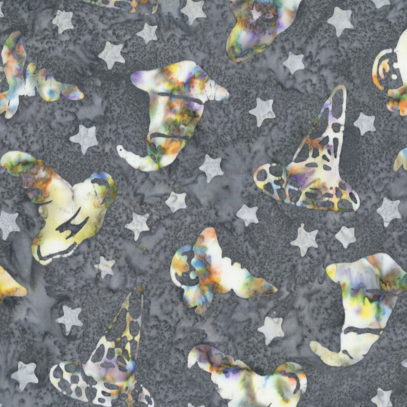 Smoke gray batik with a tossed design of heather gray stars and a medley of stylized multicolored witch hats.