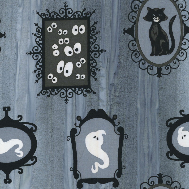 Gray batik with a directional wash and scattered, ornamental frames and mirrors filled with ghosts, black cats, and googly eyes.