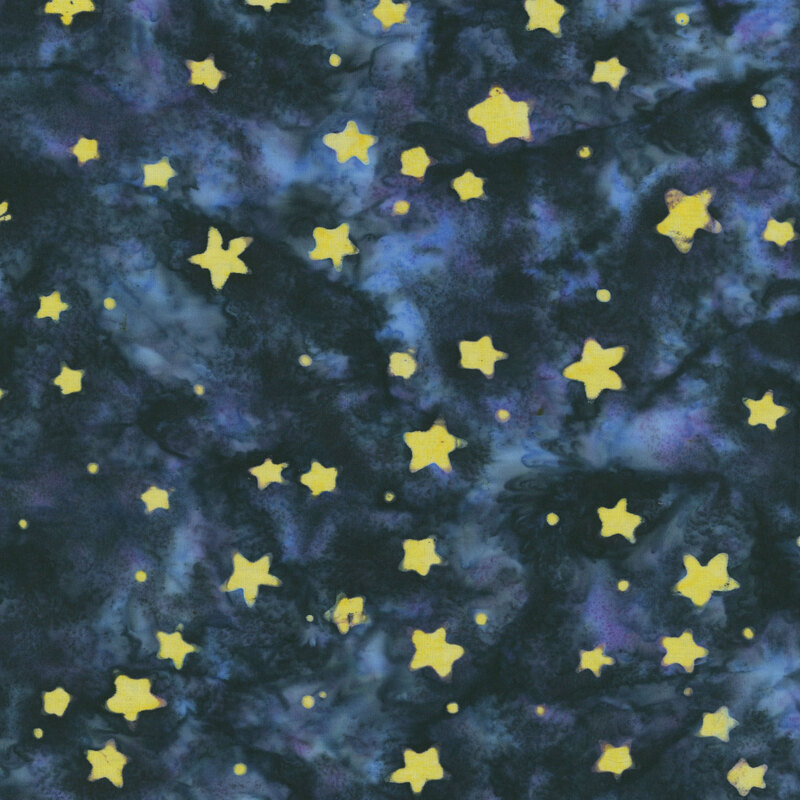 Midnight blue and black batik with a tossed design of yellow stars and dots.