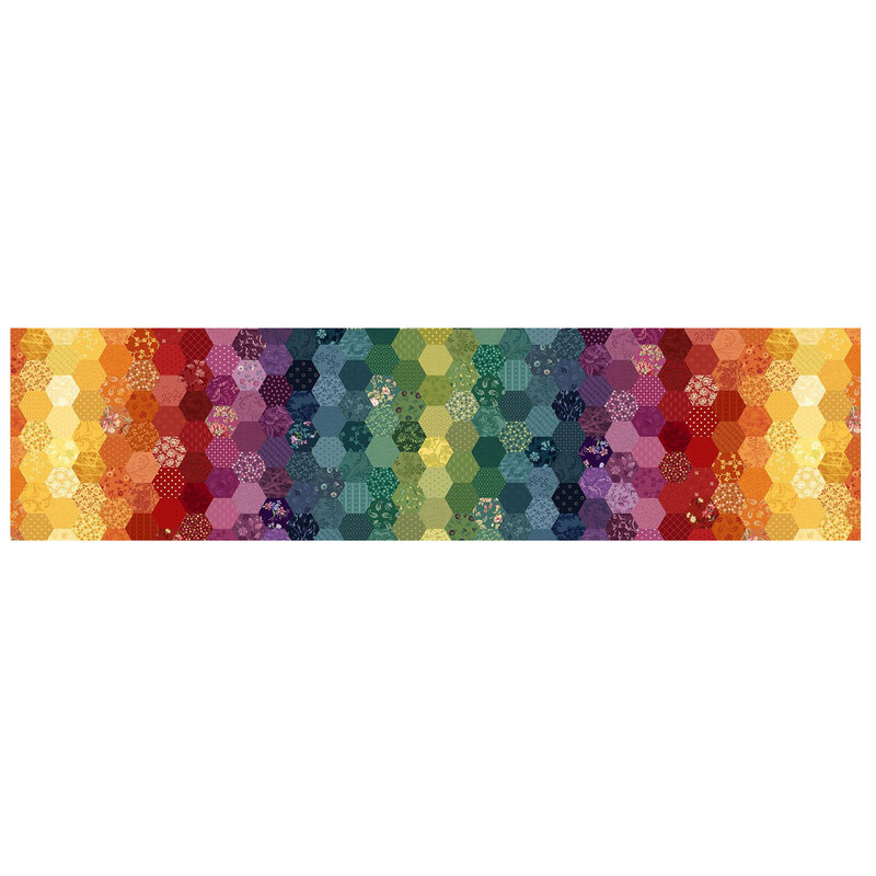Ombre rainbow colored fabric with a hexagon cheater pattern combining floral, paisley, and geometric designs.