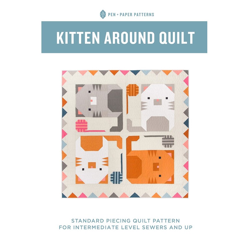 front cover of the Kitten Around Quilt pattern featuring a geometric kitten quilt with yarn balls and a triangle border.