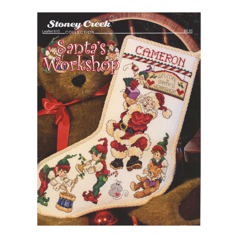 Front cover of the pattern booklet showing the finished stocking displayed with a teddy bear on a wooden chair.