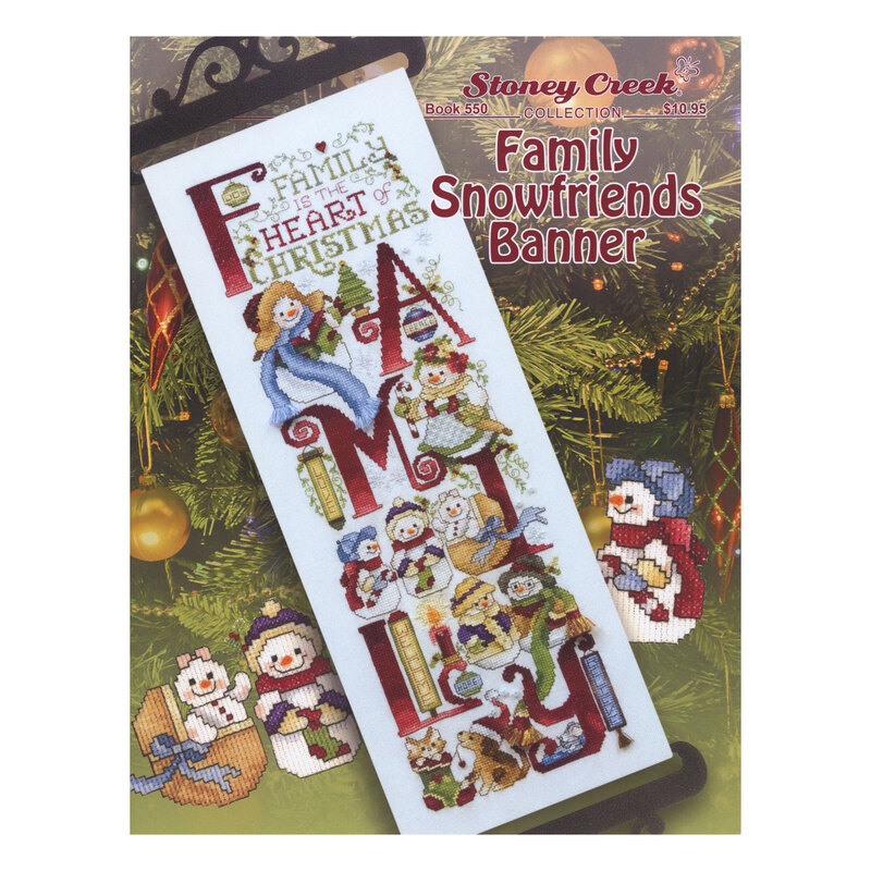 Front cover of the cross stitch pattern with the finished banner staged on a Christmas tree background.