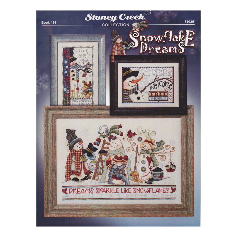 Front cover of the cross stitch pattern with the finished projects staged on a blue background.