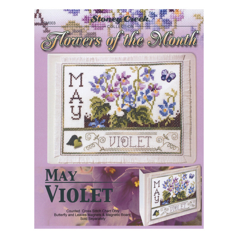 Front cover of the cross stitch pattern with the finished project shown in an enlarged version and a version on a magnet board.