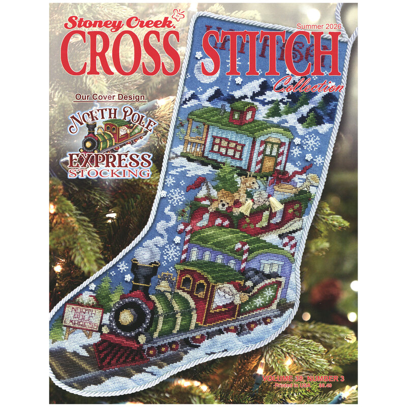 Front of cross stitch pattern book showing the main pattern North Pole Express Stocking finished. 