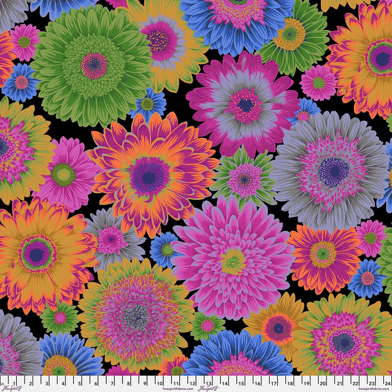 Tossed gerbera daisies in saturated colors like magenta, green, orange, ocher, and blue.