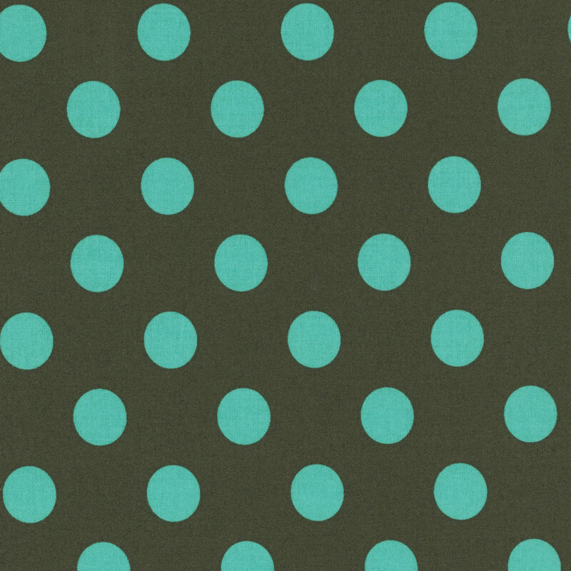 Dark gray teal fabric adorned with a pattern of large, vibrant aqua polka dots.