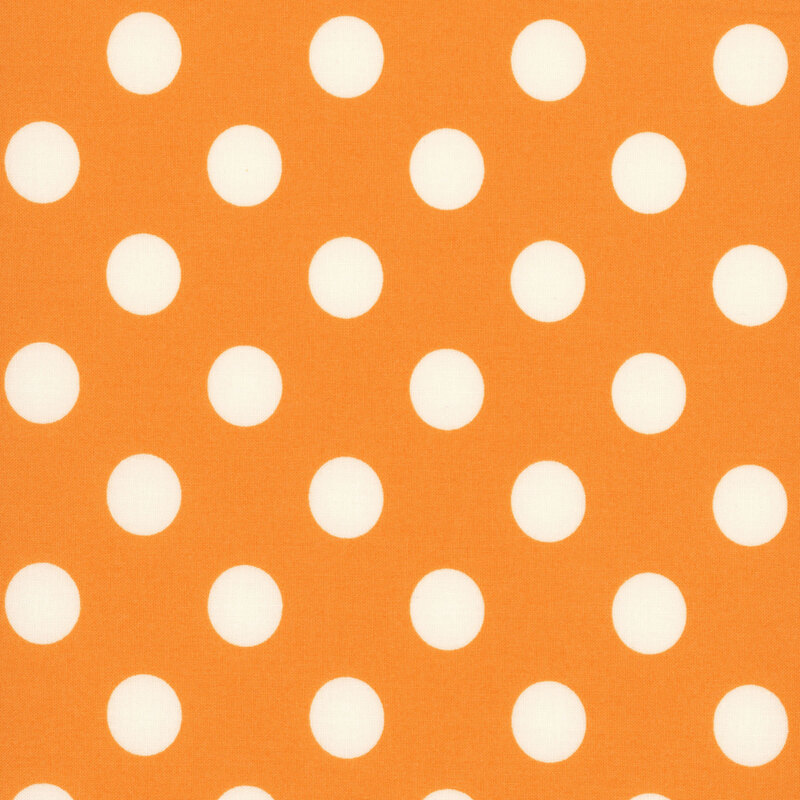 Orange fabric adorned with a pattern of large white polka dots.