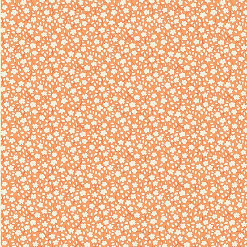 Tangerine orange fabric with a white leafy and floral calico print.