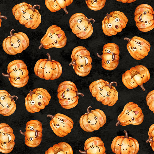 Tossed orange pumpkins with a variety of expressive faces on a pitch black background.