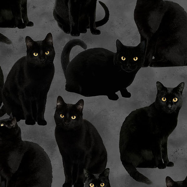 Mottled gray fabric with scattered black cats in different poses with yellow eyes.