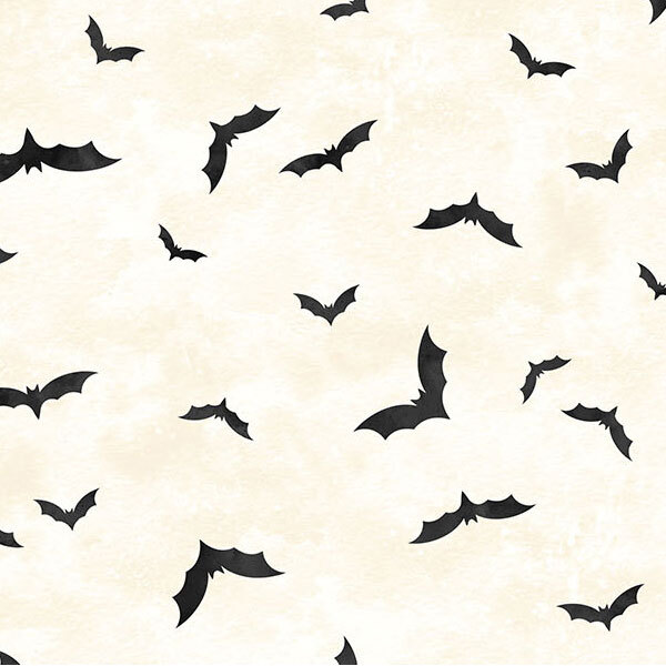 Mottled cream fabric with a tossed pattern of black bats.