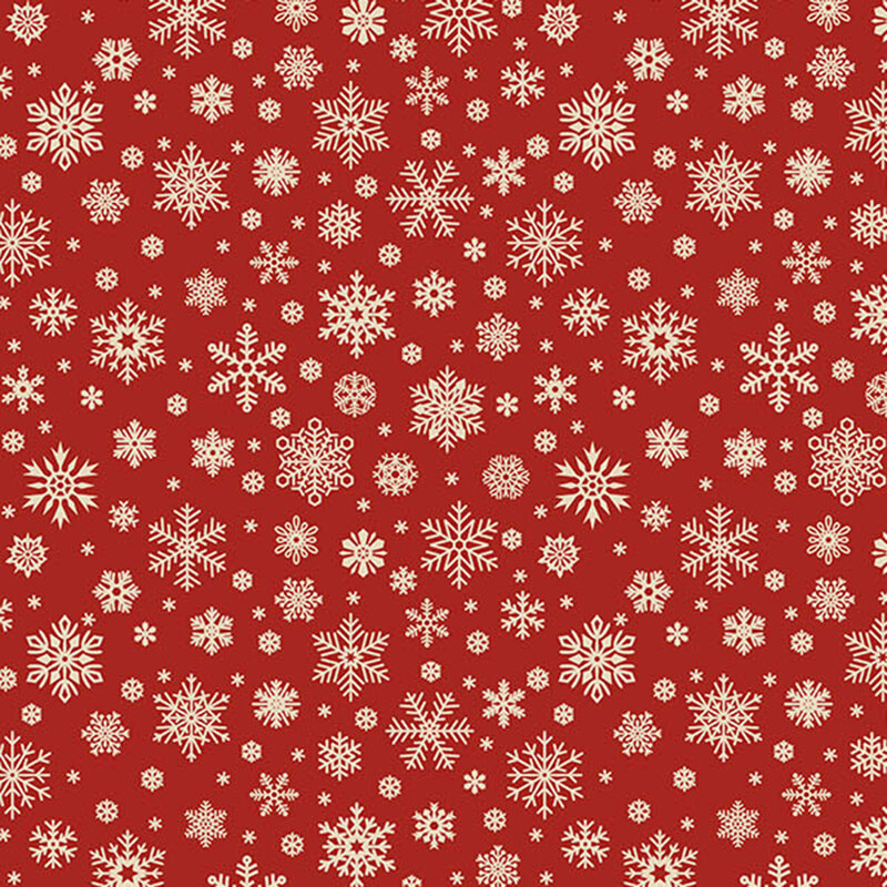 Festive red fabric with a wide variety of light beige snowflakes.