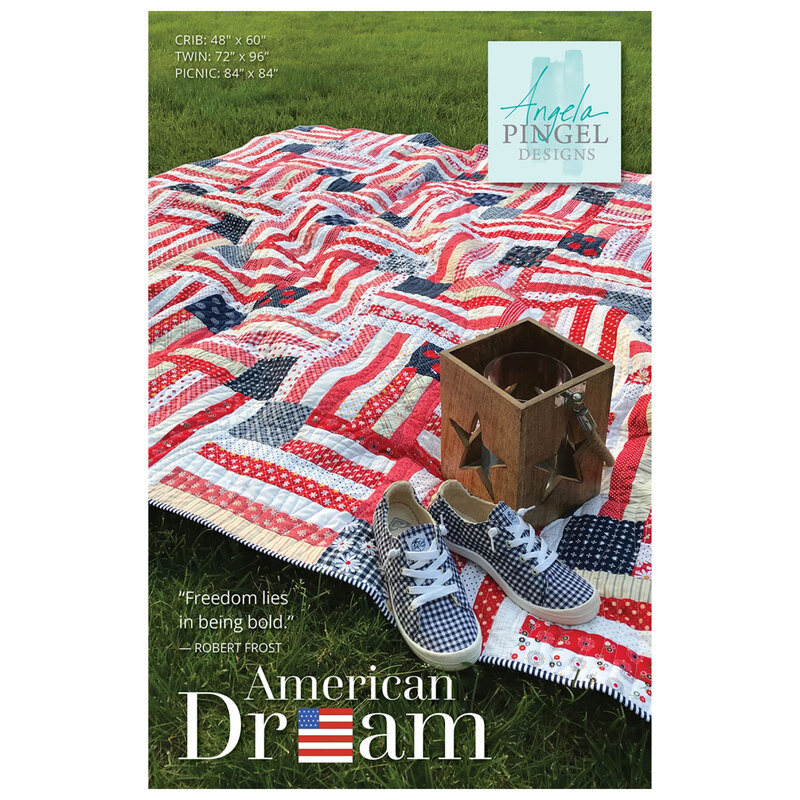 American Dream quilt pattern cover showing a red, white, and blue patchwork quilt with repeated flag-inspired blocks displayed on grass.