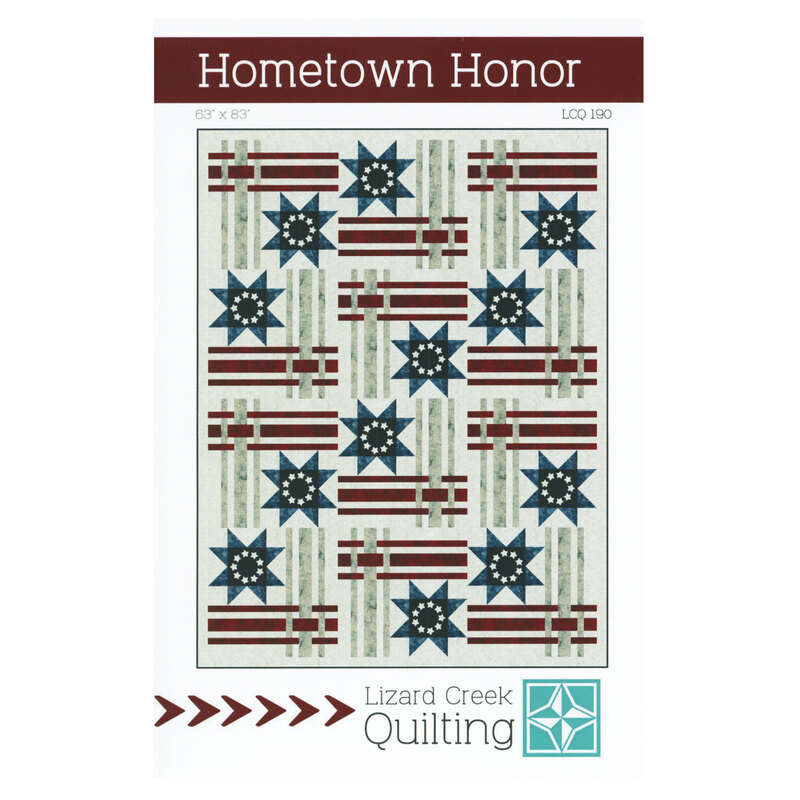 Front cover of the pattern showing the completed quilt, colored in red, gray, and blue batik fabrics.