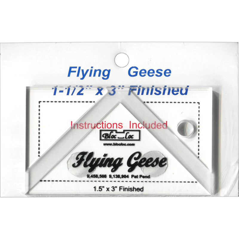 The 1.5" x 3" Flying Geese Square Up Ruler in its packaging and isolated on a white background. 