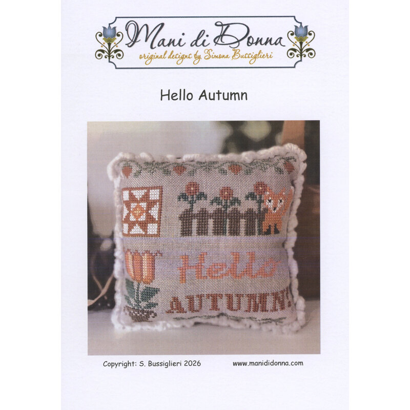 Cross stitch pillow pattern cover reading “Hello Autumn” with a fall-themed stitched cushion.