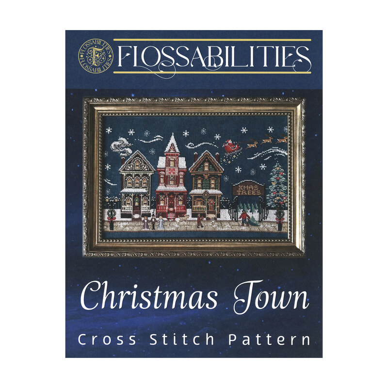 Front cover of the Christmas Town cross stitch pattern with the finished pattern in an ornate gold frame isolated on a wispy blue background.