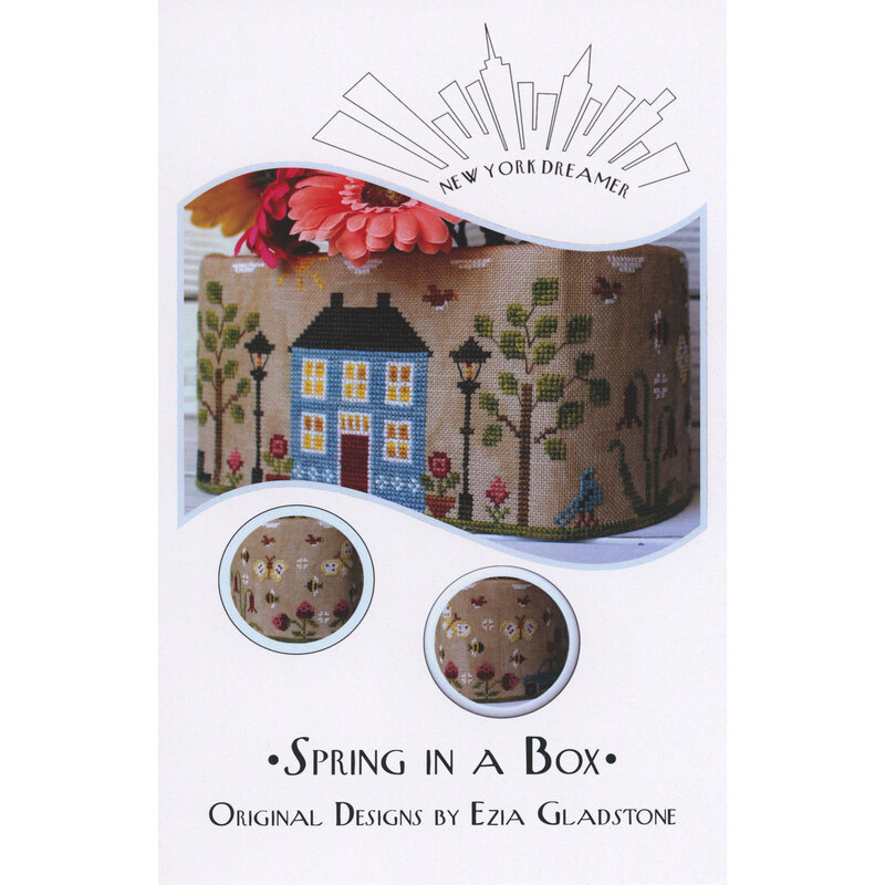 Cover of “Spring in a Box” by Ezia Gladstone, showing floral embroidery on a gift box design.