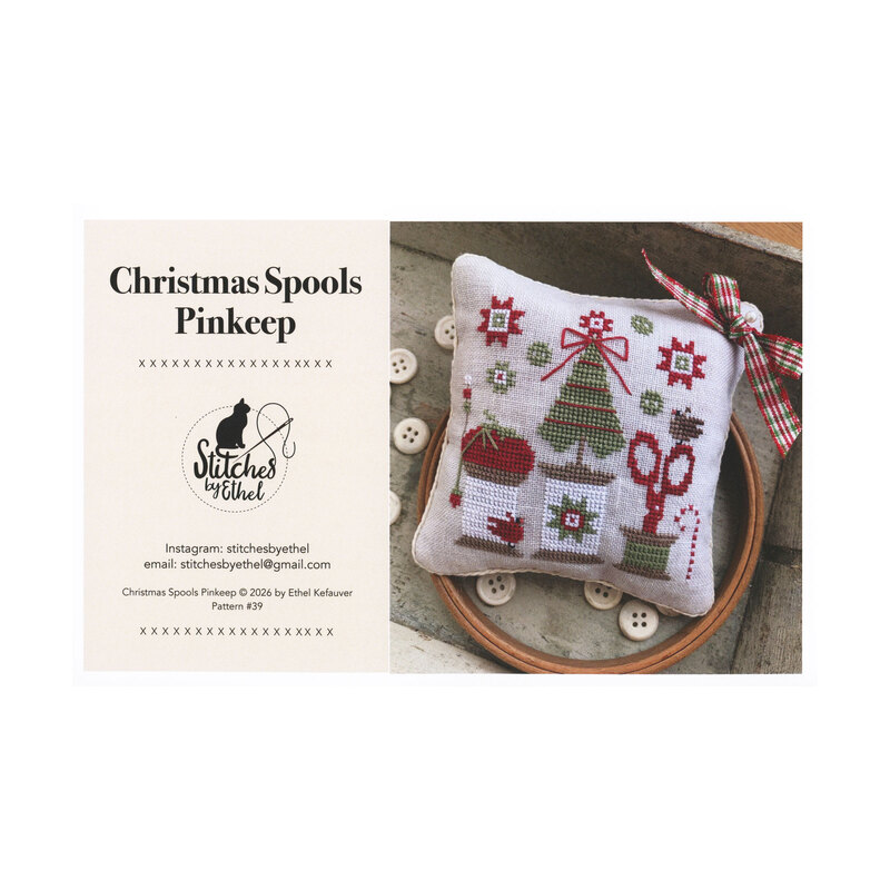 The front of the Christmas Spools Pinkeep showing the completed pinkeep.