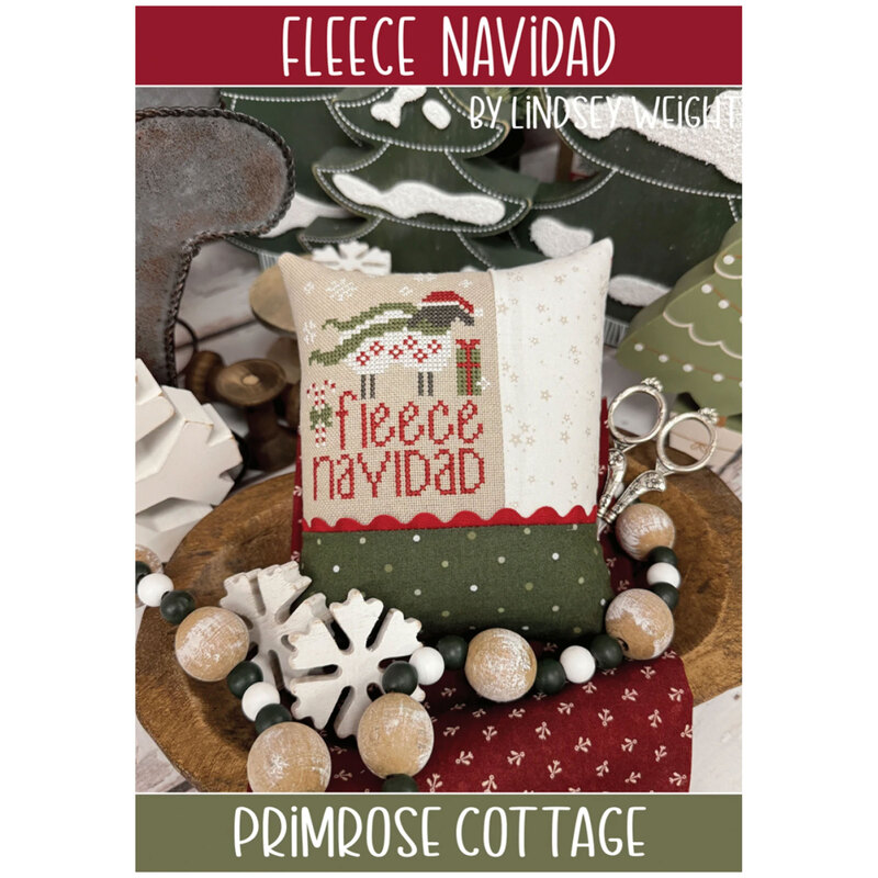The front of the Fleece Navidad Cross Stitch pattern by Primrose Cottage showing the finished project.
