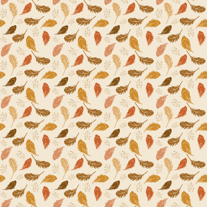 Cream fabric with a pattern of tossed fall-colored feathers and leafy sprigs.