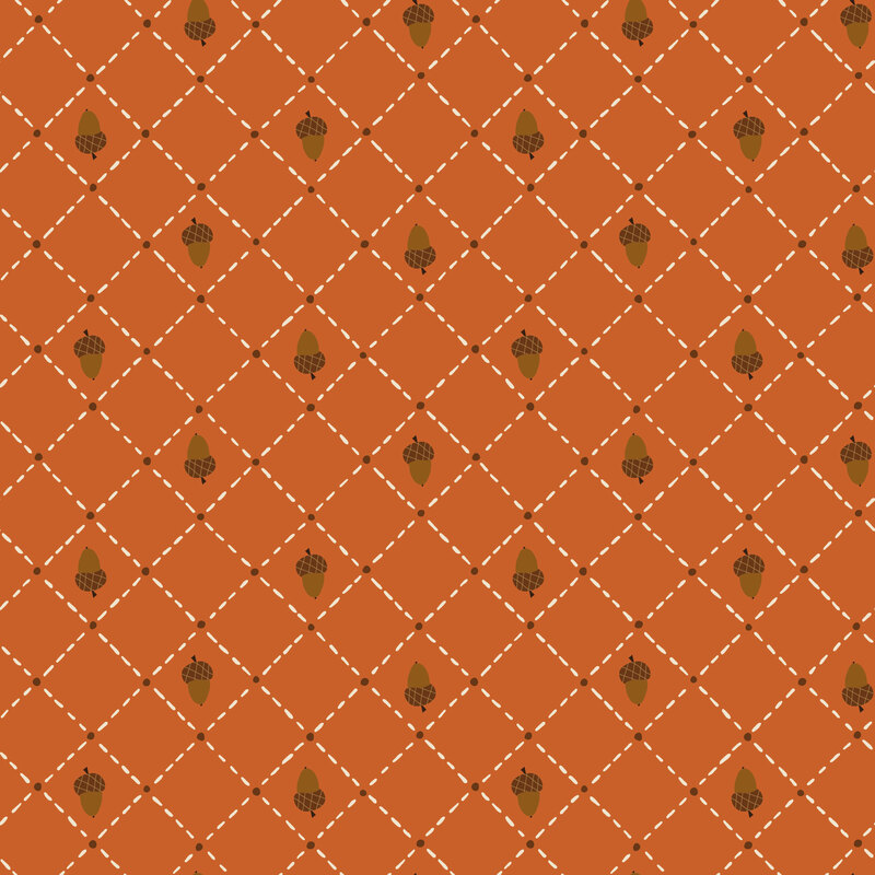 Dark orange fabric with a dashed and dotted grid pattern filled with flipped acorns.