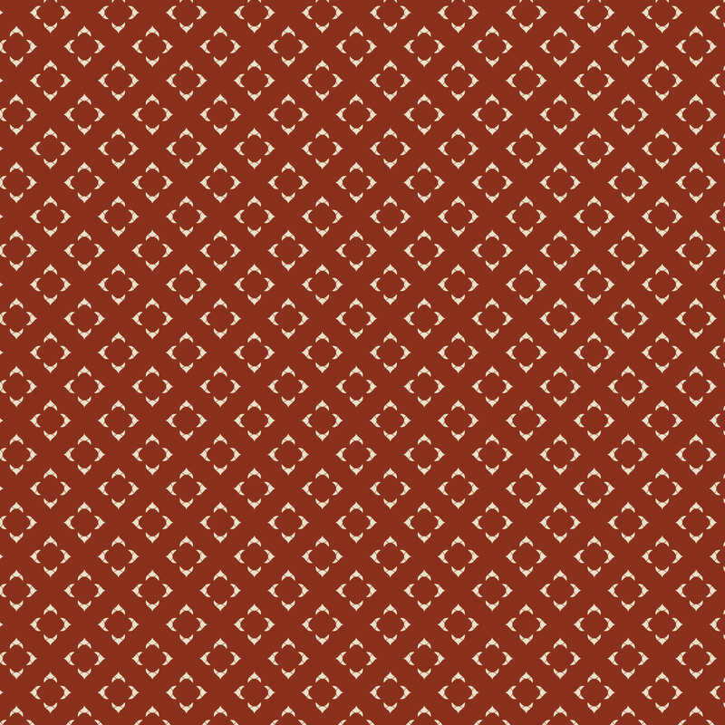 Dark terra cotta orange fabric with a grid of cream primitive, square geometrics.