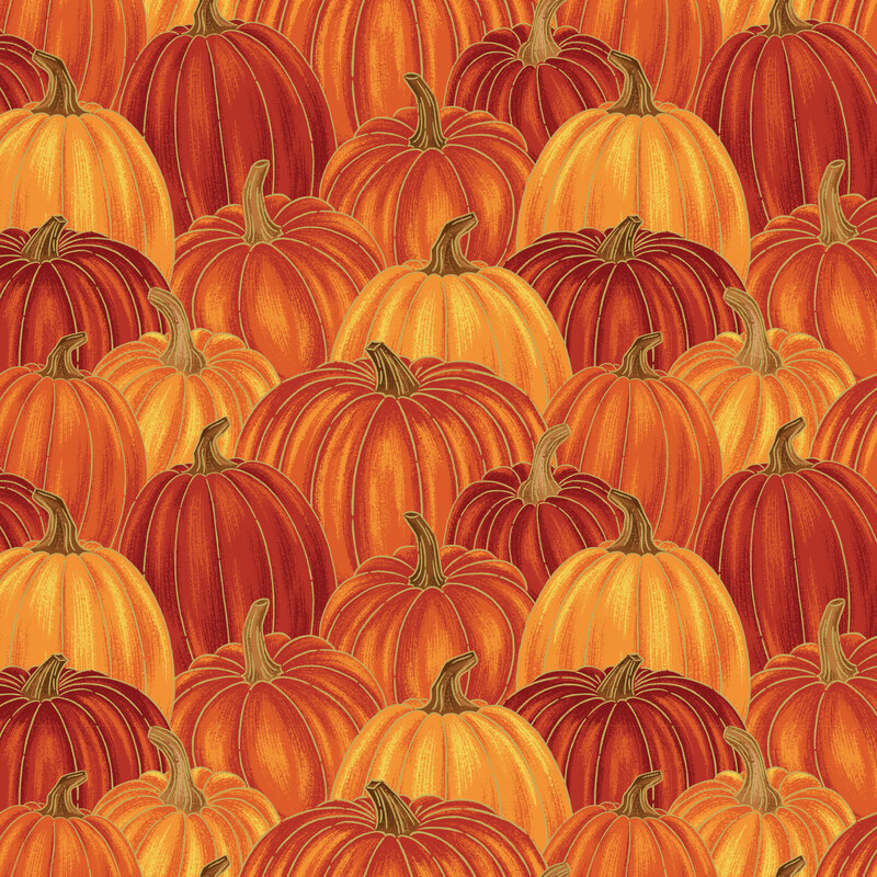 packed pattern of orange and rust pumpkins accented with gold metallic details.