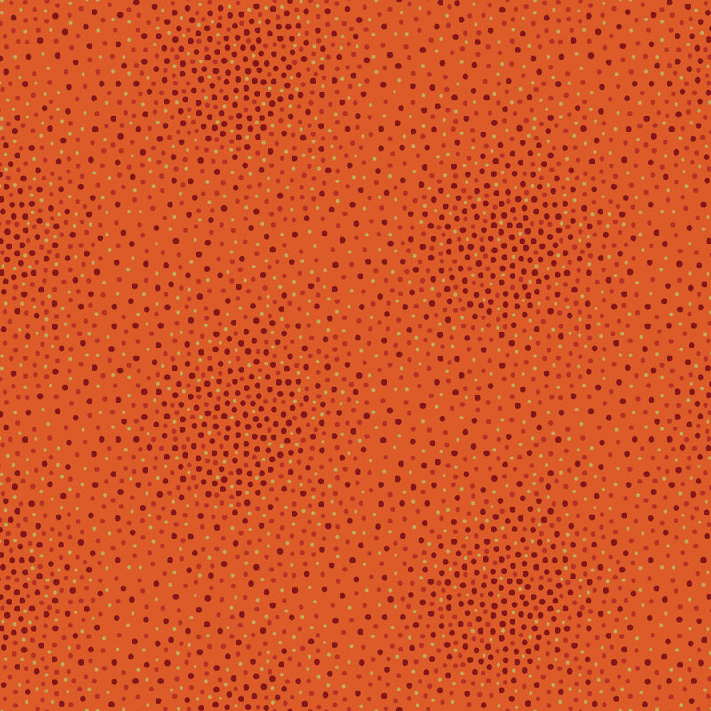 dark red and gold metallic dots scattered across a red orange background.