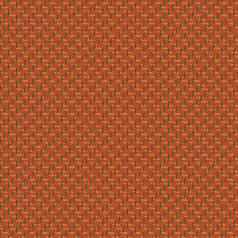 Burnt sienna fabric with a simple brown and orange pattern of biased ginghams.