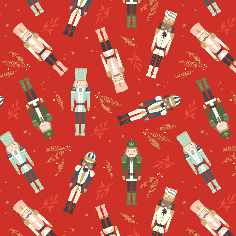 A Christmas red fabric with scattered nutcrackers and leafy sprigs.